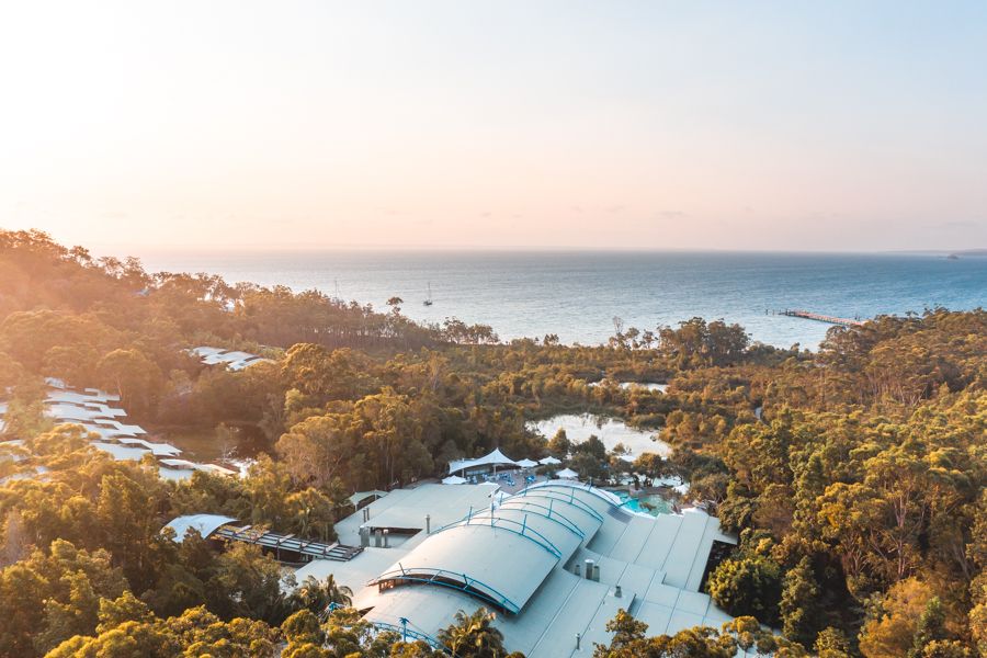kingfisher bay resort buildings next to kgari ocean