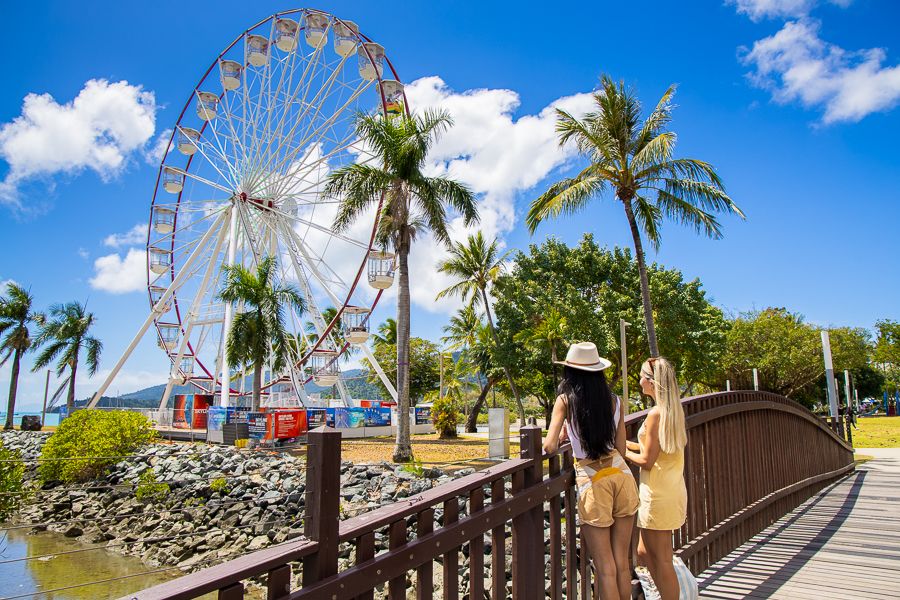 Two girls admiring the Airlie Beach ferris wheel
