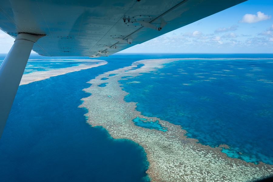 seaplane flying over great barrier reef