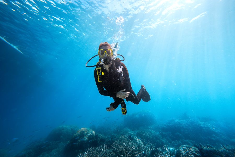 girl scuba diving on the great barrier reef