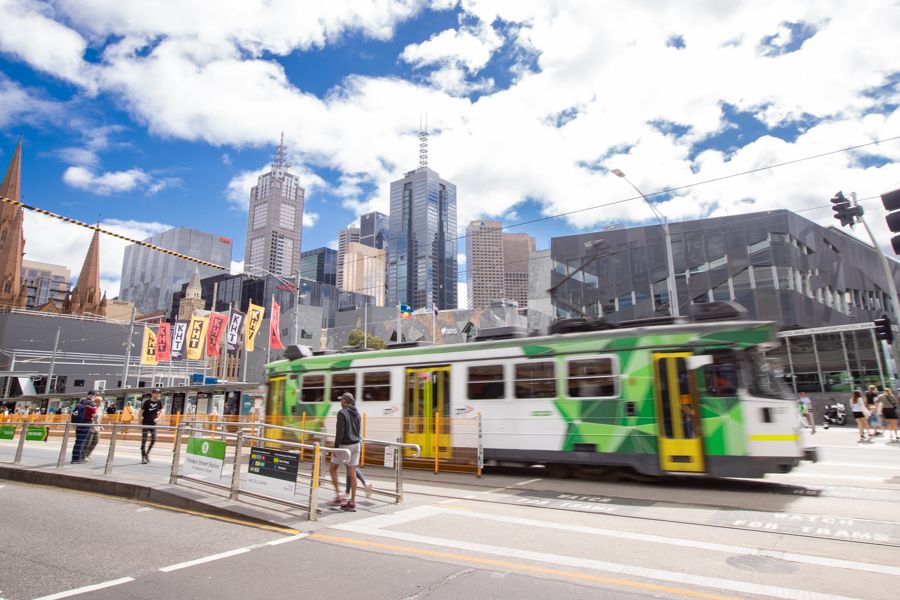 trams running through downtown melbourne