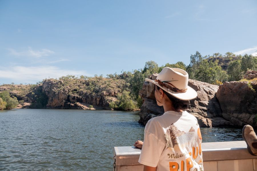 girl in a hat admiring katherine gorge australia