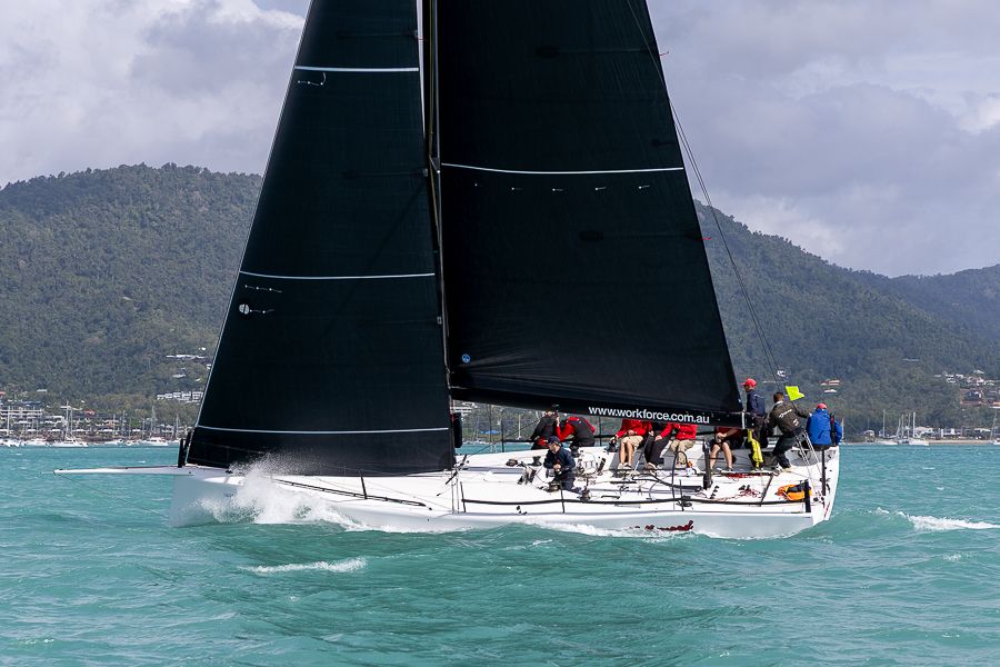 Team Hollywood racing yacht with black sails