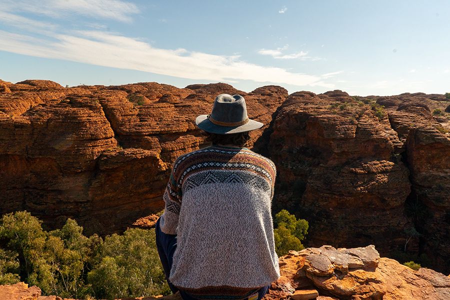 man admiring the rugged kings canyon outback