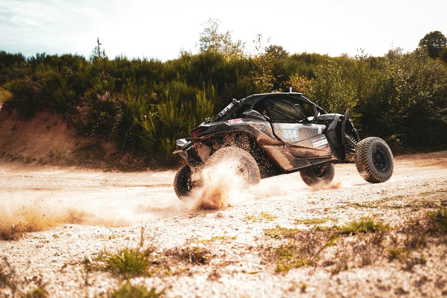 off roading buggy riding across the sand