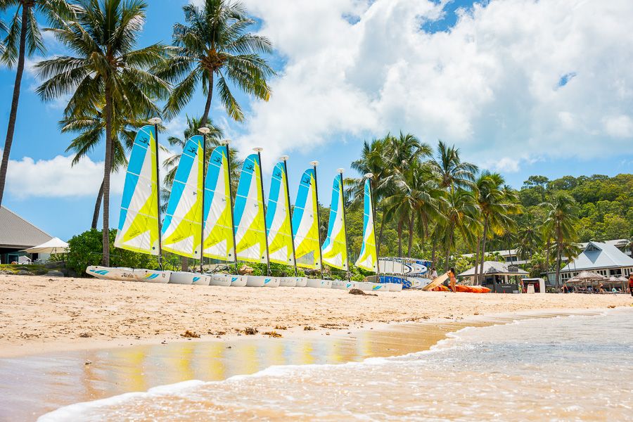 Sailing boats on Catseye Beach on Hamilton Island