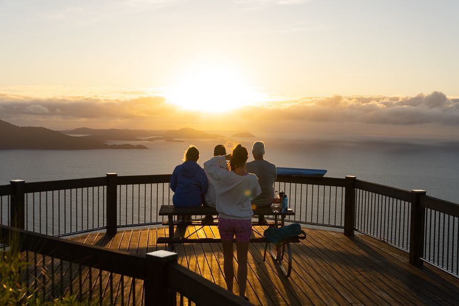 people admiring the sunset in the whitsundays