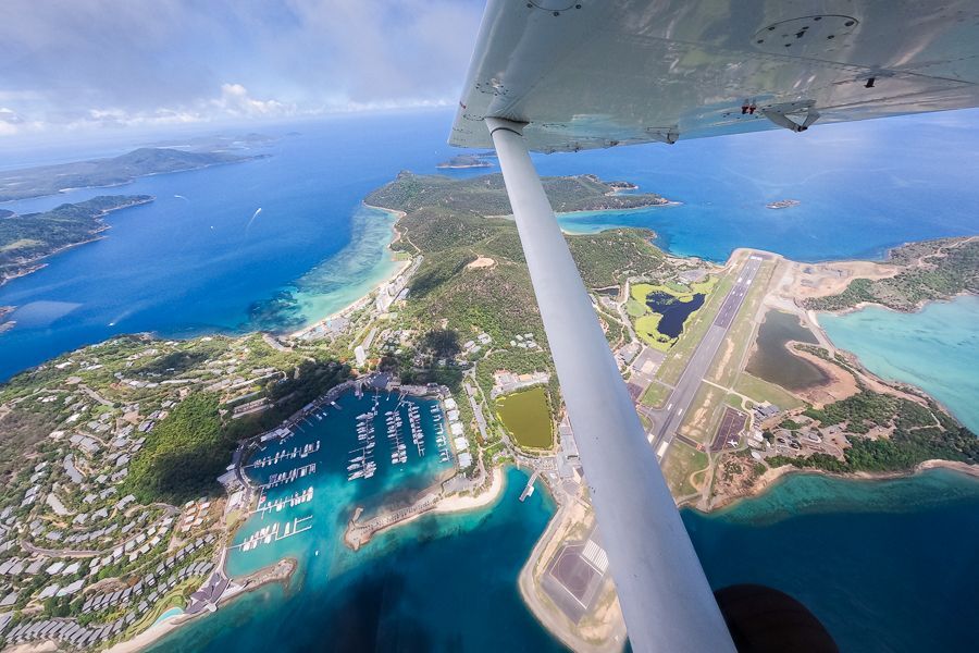 aerial view of flying over airlie beach and whitsundays