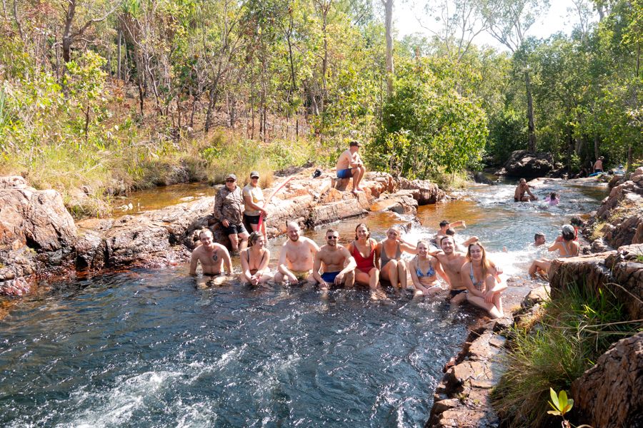 group swimming in buley rockhole litchfield national park