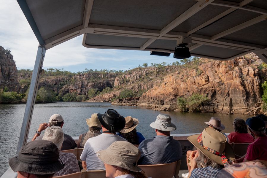 people admiring katherine gorge on a river boat cruise