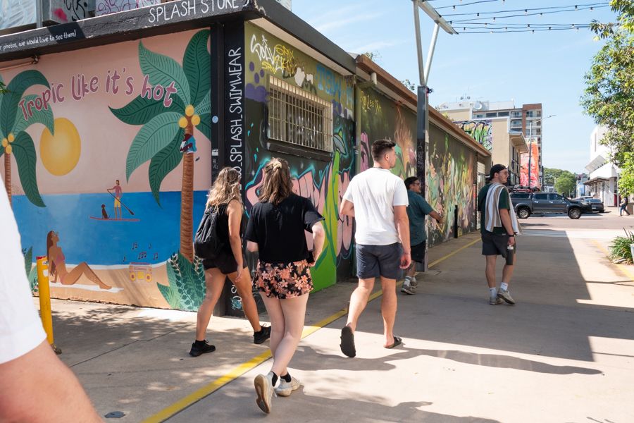people walking around darwin city streets