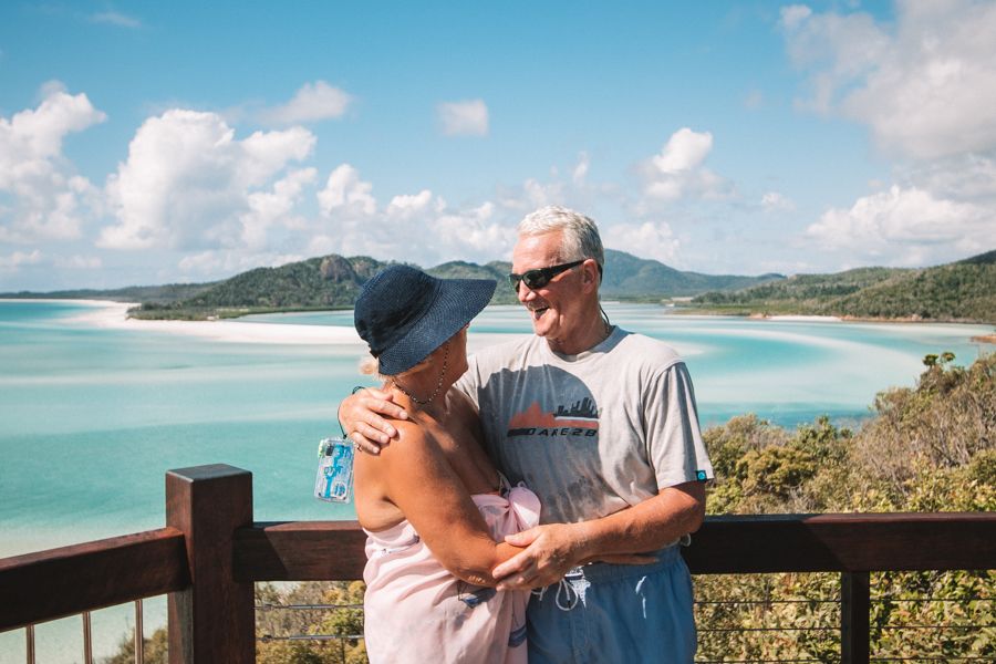 Romantic old couple at Hill Inlet Lookout, Whitsundays, Australia