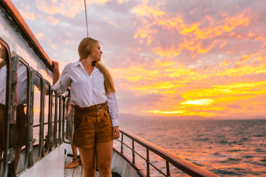 Girl looking the sunset, Whitsundays, Australia