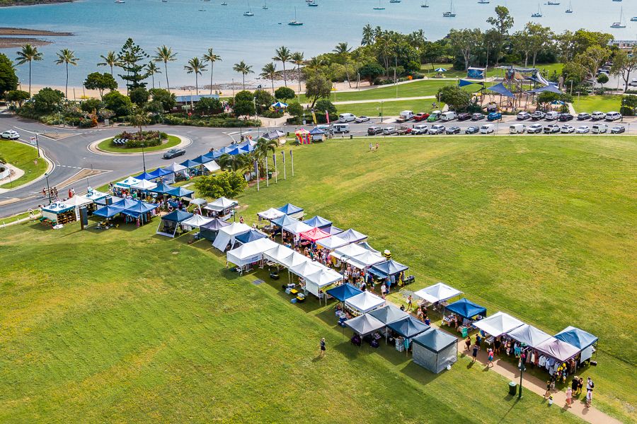Airlie Beach Markets a drone shot of market stalls in airlie beach