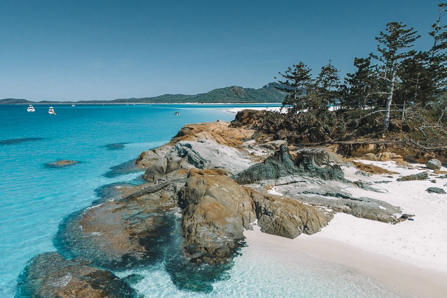 bettys beach with white sand and rocks on whitsunday island