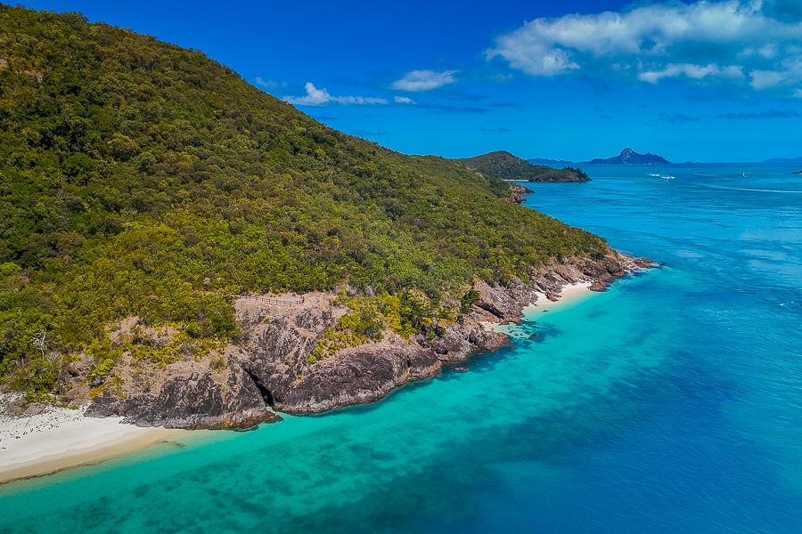 whitsunday island beach and mountain scenery