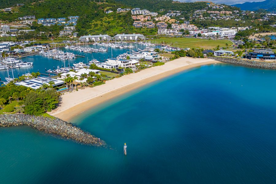 aerial view of airlie beach marina and oceanfront