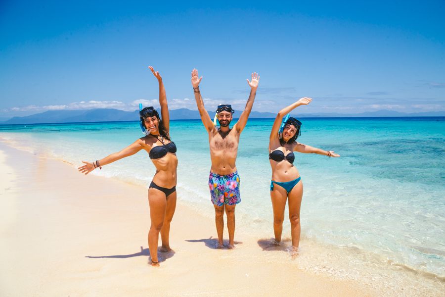 Three people about to go for a snorkel, Whitsundays