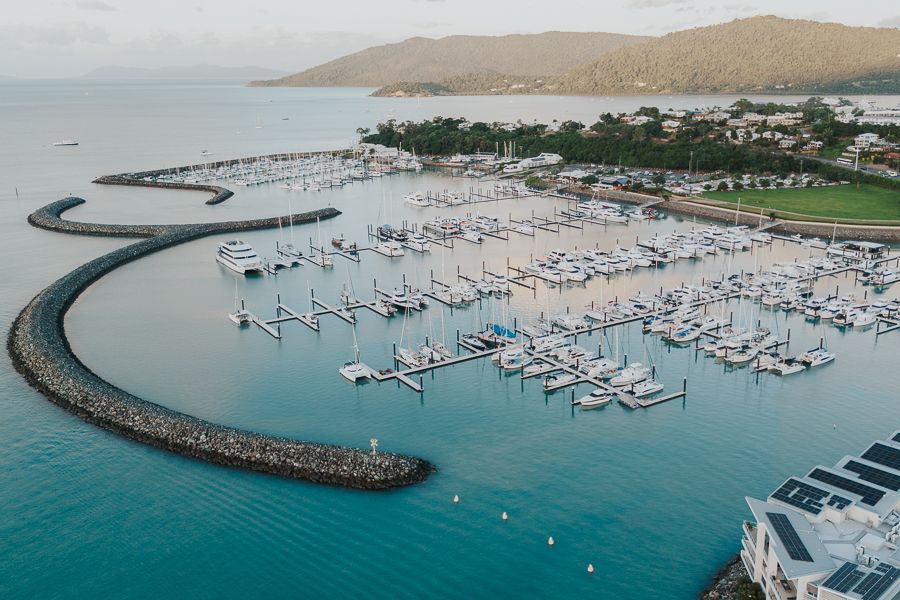 aerial view of coral sea marina in airlie beach